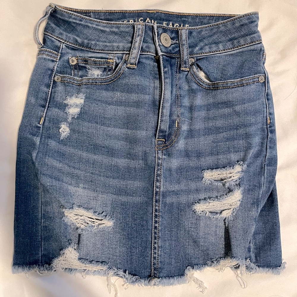 denim skirt with rips